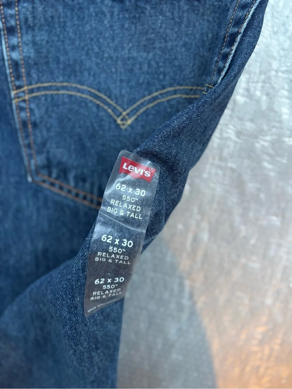 NWT Levi's 550’s with a 63W x 30L relaxed fit.